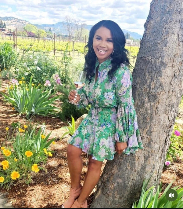 Customer outdoors wearing a Monroe body wave install