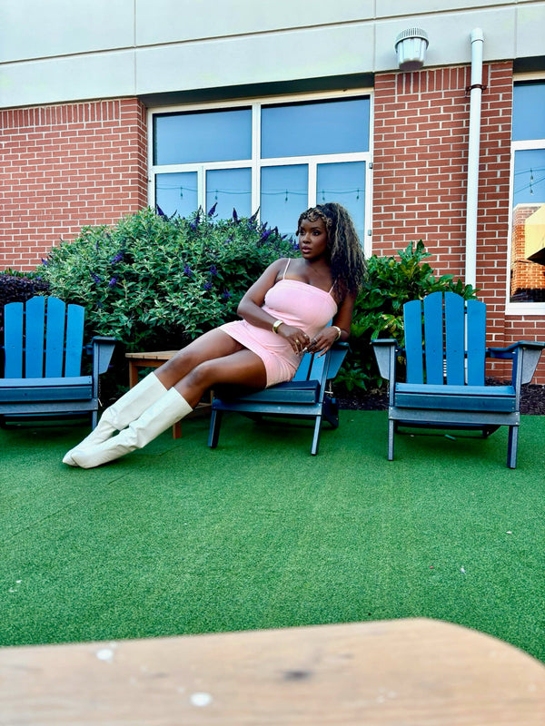 Customer outdoors wearing a Tremé 4K Feather Crochet install
