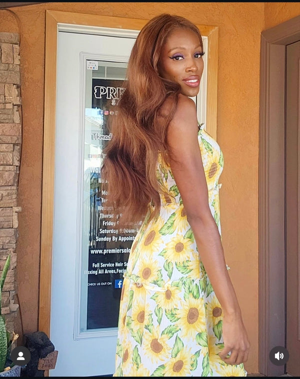 Customer wearing a colored Virginia kinky straight install