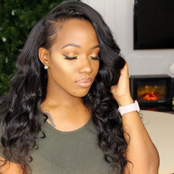 Customer wearing a side-parted Savannah loose wave install