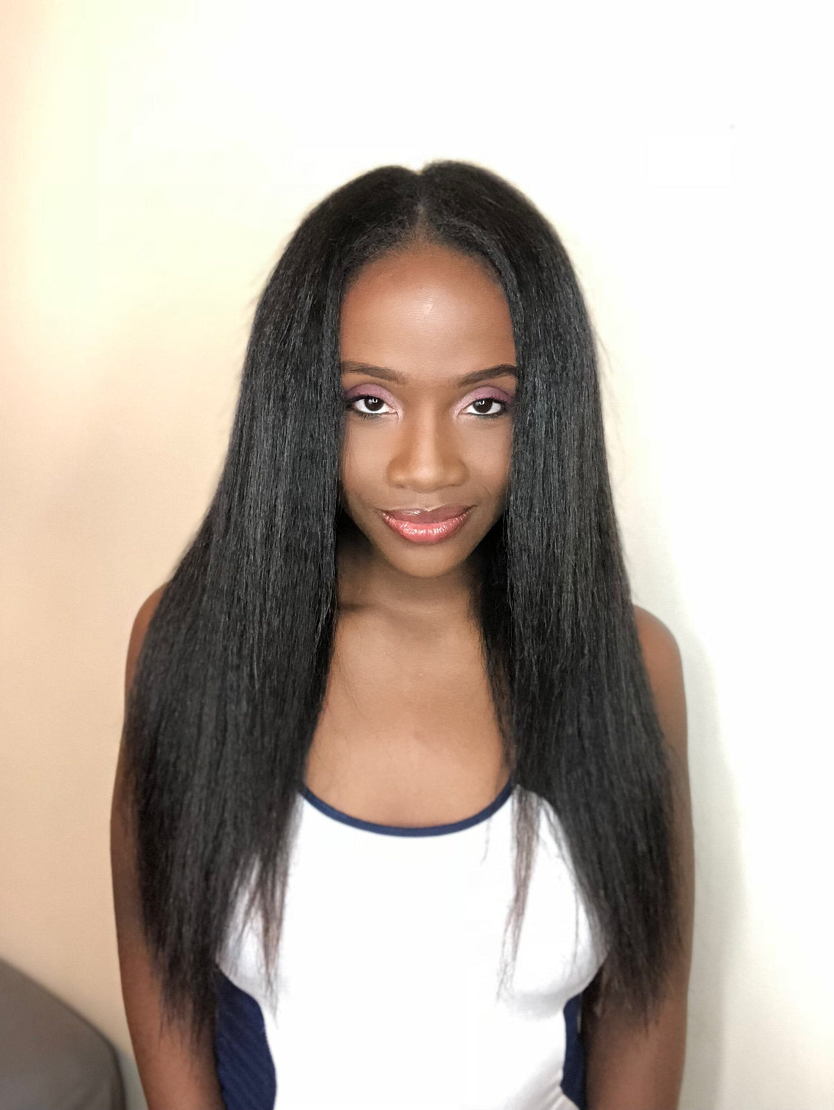 Virginia kinky straight hair install with a natural blowout look and middle part