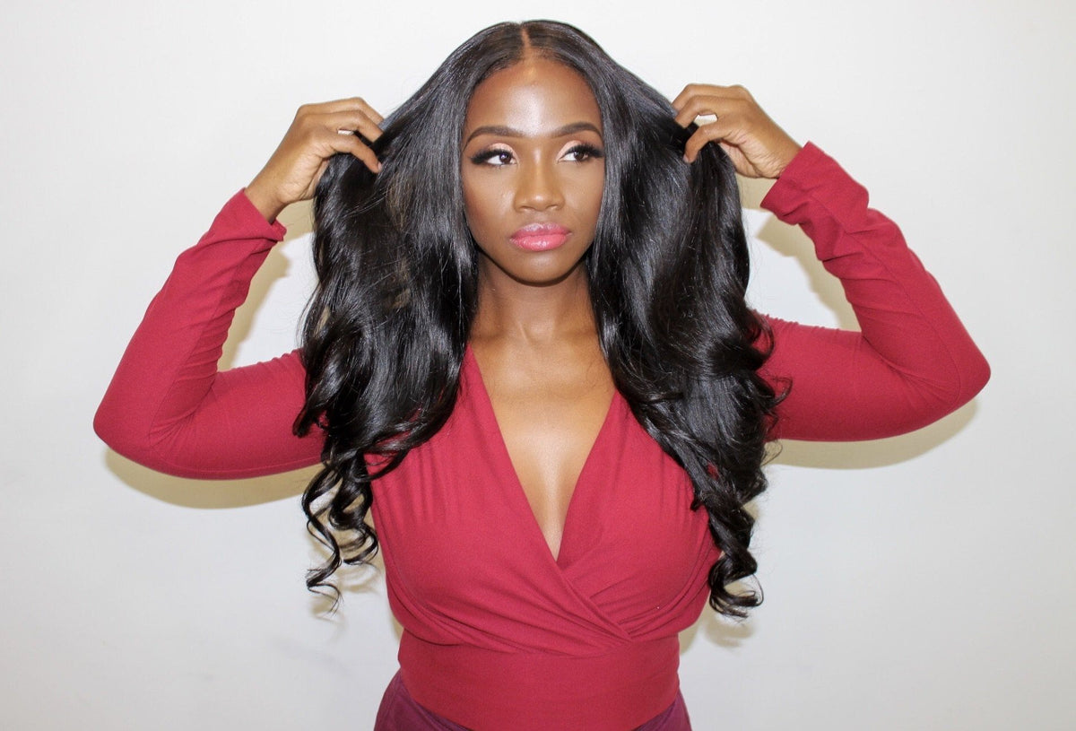 Model showing the volume of the Monroe body wave closure wig
